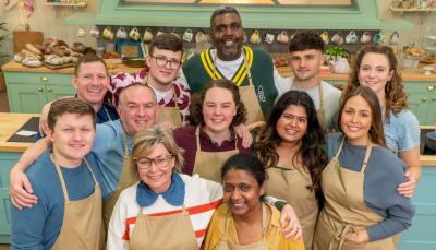 The 2023 Contestants pose in the tent for The Great British Baking Show Season 14 