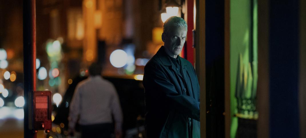 Peter Capaldi as Detective Chief Inspector Daniel Hegarty doing shady things in an alley in 'Criminal Record' Season 1